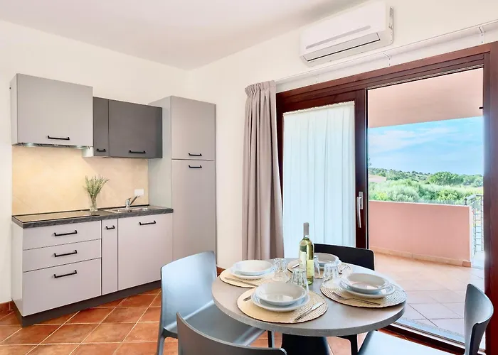 Isa-residence With Swimming-pool In Isola Rossa, With Air Conditioning And Private Outdoor Area Apartmanhotel